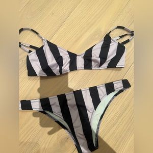 Purple and black solid and striped bikini